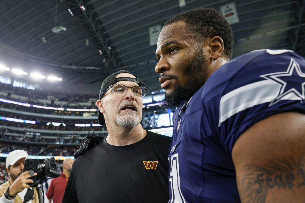 ARLINGTON, TX - JANUARY 05: Dallas Cowboys linebacker Micah Parsons 11 and Washington Commanders Head Coach Dan Quinn talk after the game between the Dallas Cowboys and the Washington Commanders on January 5, 2025 at AT&T Stadium in Arlington, Texas. Photo by Matthew Pearce/Icon Sportswire NFL, American Football Herren, USA JAN 05 Commanders at Cowboys EDITORIAL USE ONLY Icon169250105843 trade